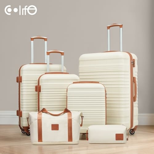 Beige luggage set with various sizes and styles.