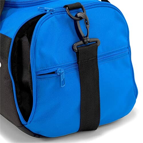 Close-up of a blue gym bag with a zipper and clip.
