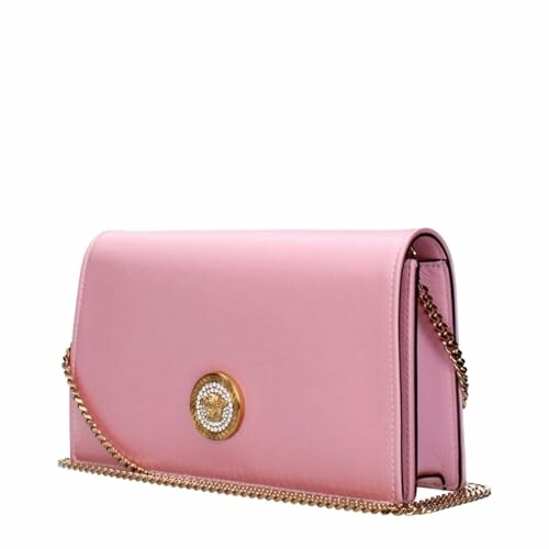 Pink shoulder bag with gold chain and decorative emblem.