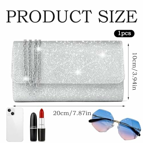 Silver glitter clutch bag with chain, shown with phone, lipstick, and sunglasses for size comparison.
