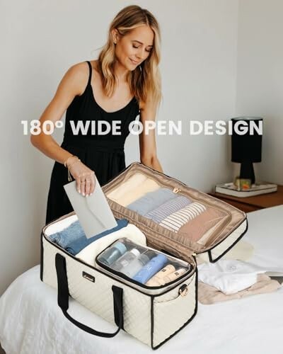 Woman packing an organized suitcase on a bed.